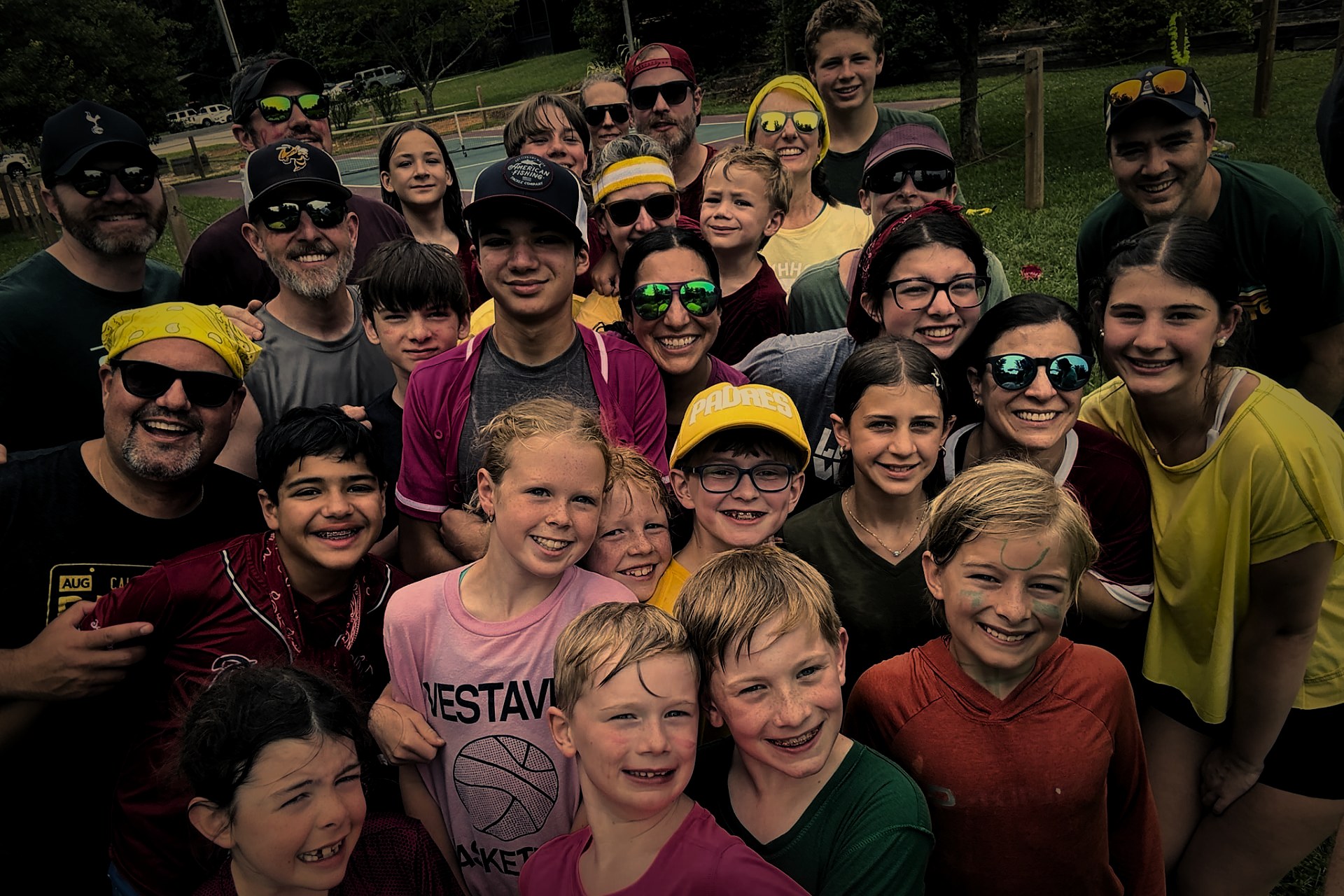 Eisa Shunnara with a large group of friends together outdoors